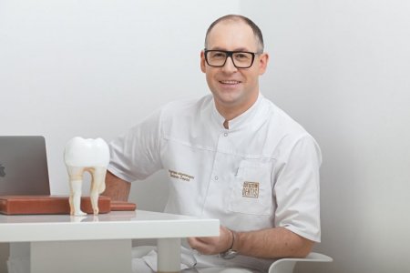 5 priežastys, kodėl verta rinktis dantų atkūrimą implantais